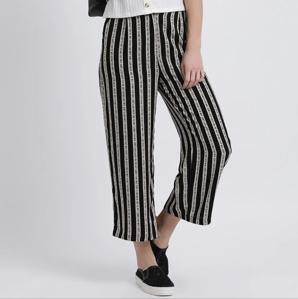 Zink London pants "don't look back you're not going that way" size M